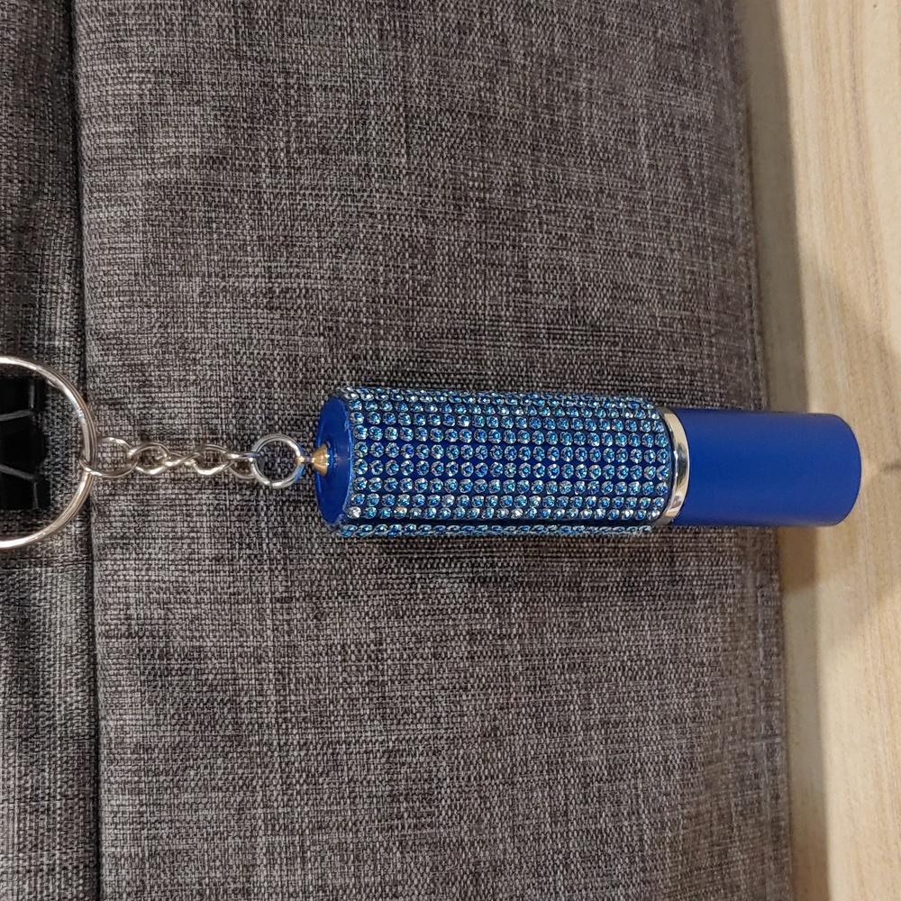 NWOT PERFUME BOTTLE KEYCHAIN